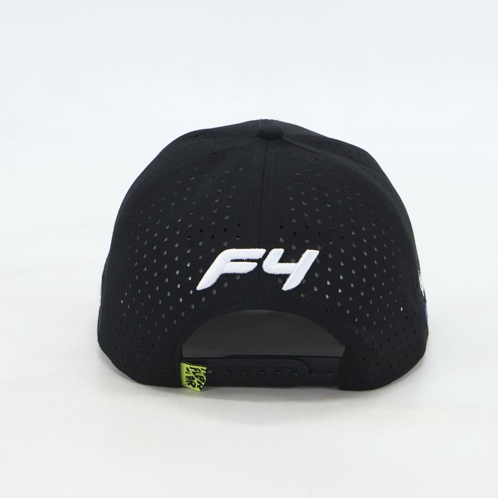Black cap, back view, white “F4” embroidery above snapback opening.