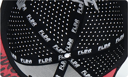 Interior view of a FLBR Motorsport baseball cap showing perforated panels and branded taping inside the crown