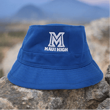Blue bucket hat with 'Maui High' logo on rocks.