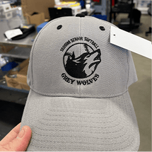 Gray cap with 'Sierra Senior Softball Grey Wolves' logo.