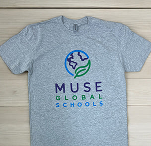 Gray MUSE Global Schools t-shirt with colorful earth logo