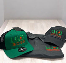 Green and gray LGD Lawn & Landscape caps with matching polo shirt