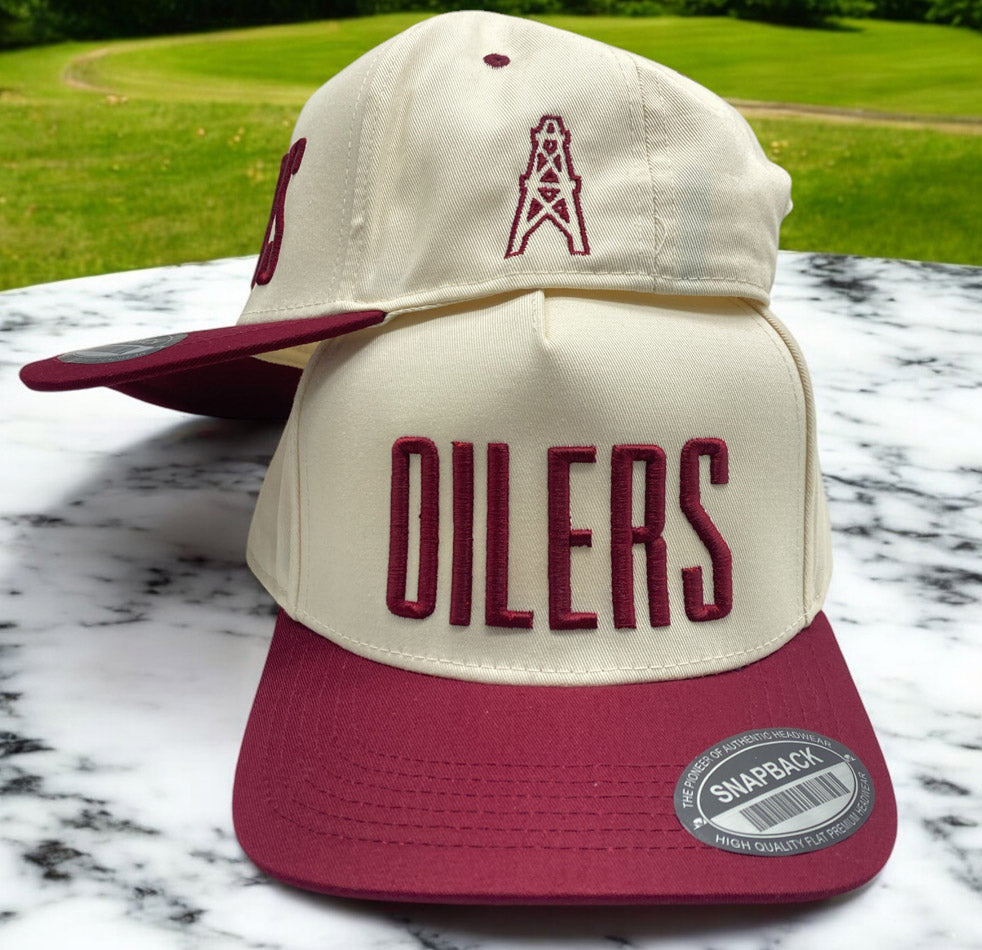 Cream and burgundy snapback hat with Oilers text and oil rig embroidery