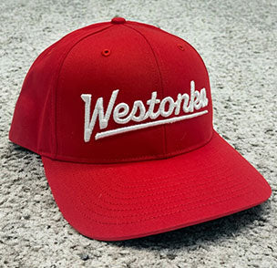 Red cap with white embroidered Westonka text logo